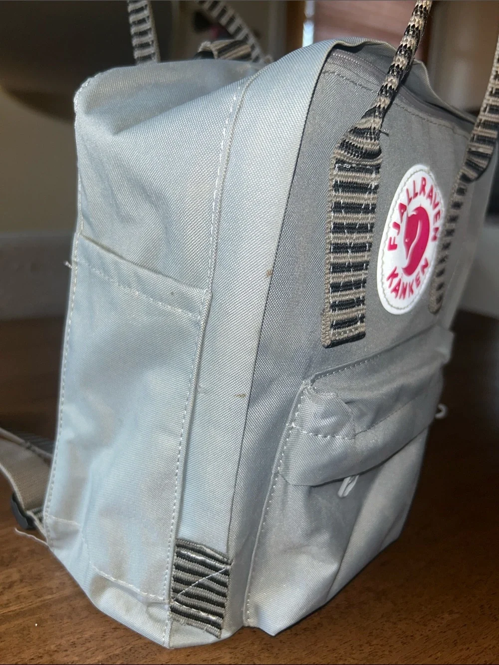 Fjallraven Kanken Mini Backpack in Light Gray with Red Logo